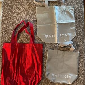Athleta Shopping Bags 1 Red, 2 silver